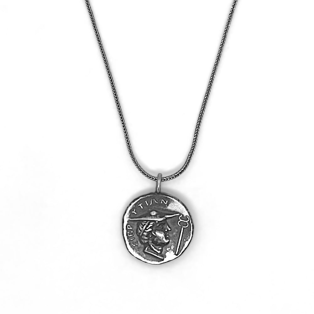 Reverse side of Silver Stater necklace featuring youthful head of Hermes with ΣΥΒΡΥΤΙΩΝ inscription from ancient Crete