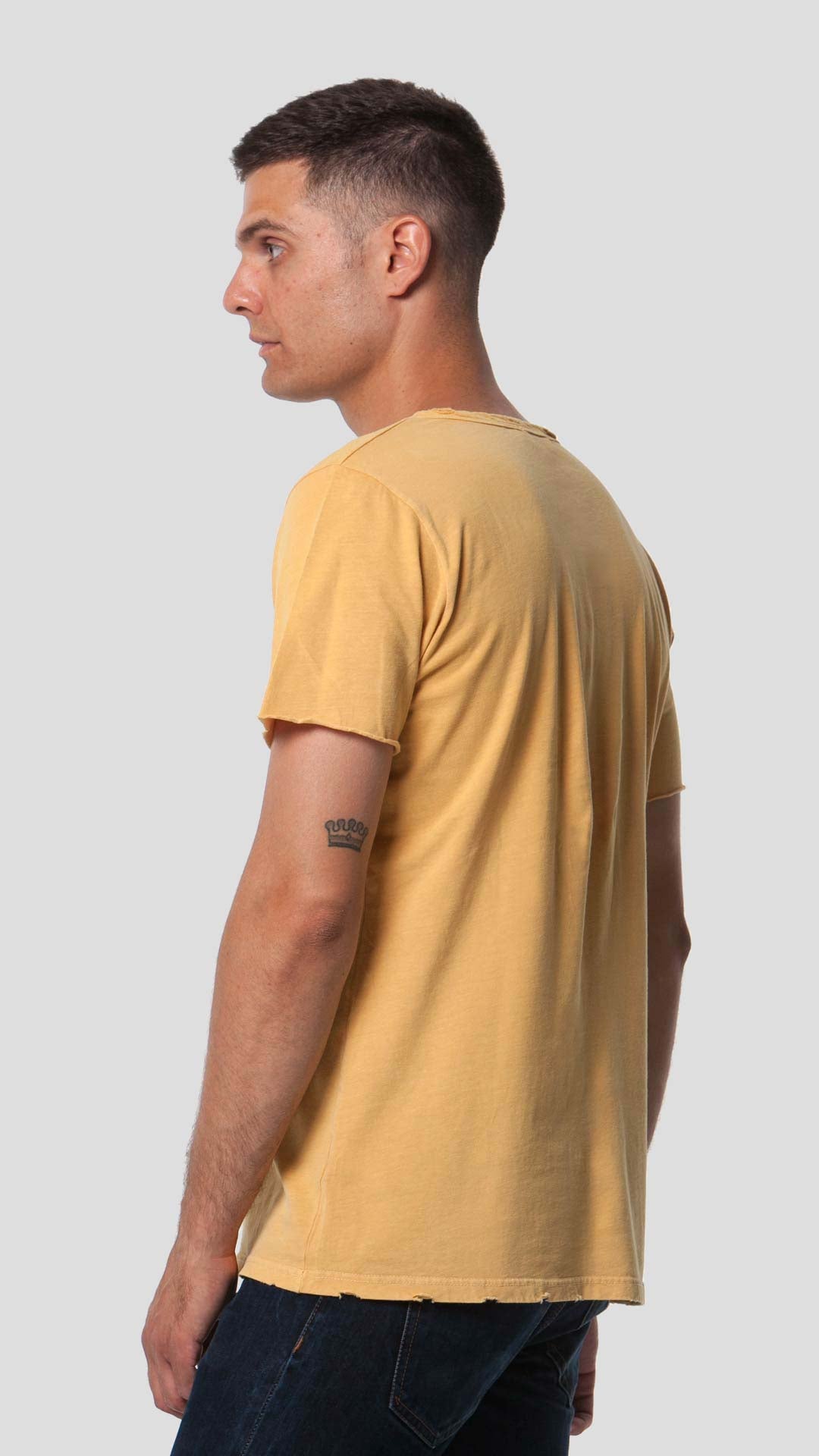 Yellow men's eco-friendly short sleeve t-shirt, side view.
